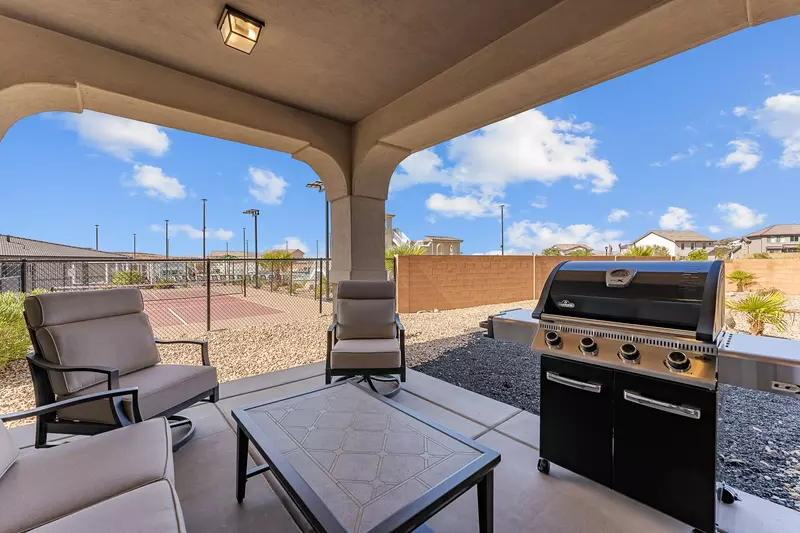 Backyard Patio with Grill & Seating Area