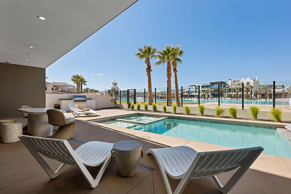 Two chairs by a resort pool