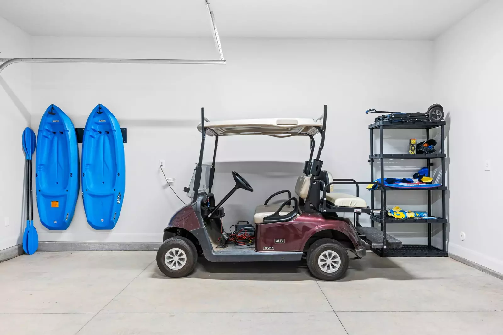 Golf Cart and 2 Kayaks