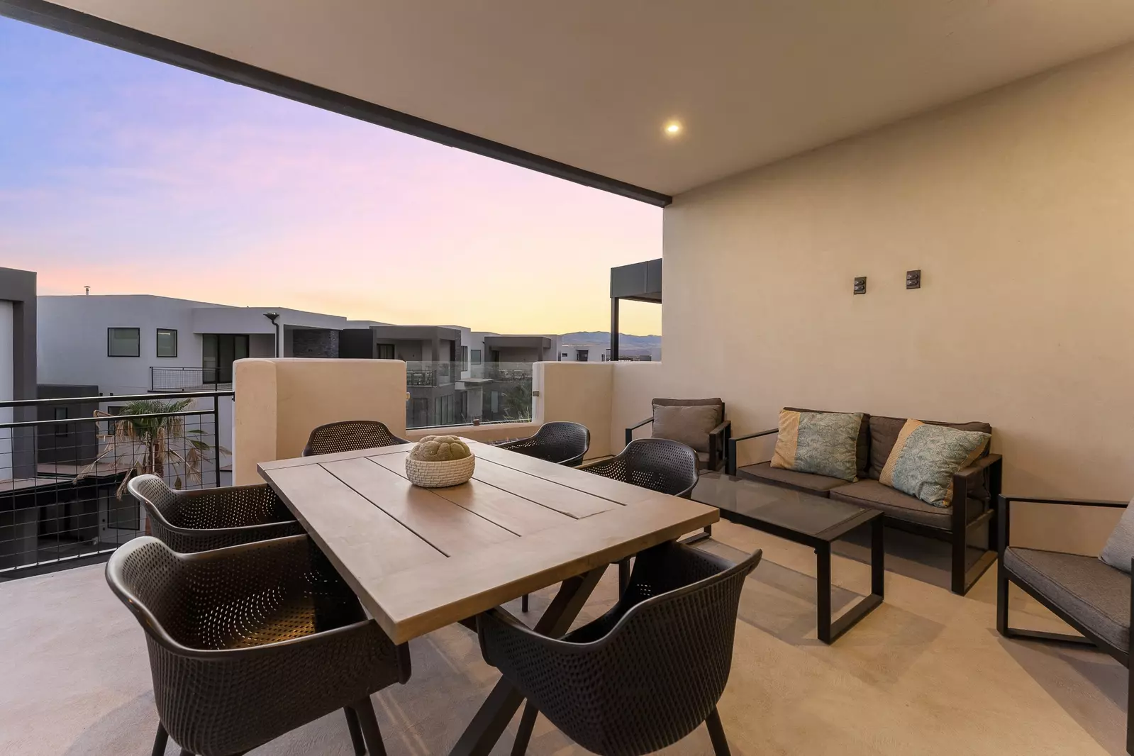 Balcony with Outdoor Seating at Sunset