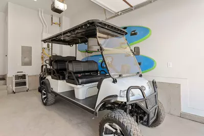 Golf Cart / 2 Paddleboards