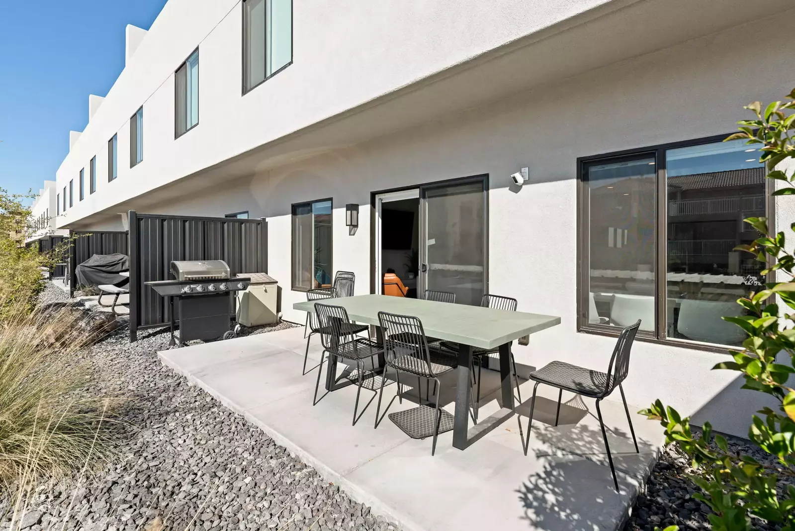 Outdoor Patio with Dining Table and Grill