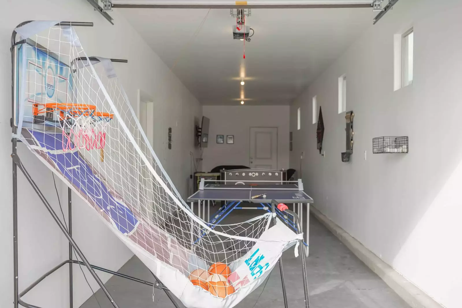 Basketball Game and Ping Pong Table in Garage