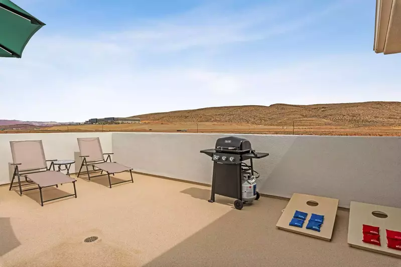 Cornhole and BBQ on 3rd Floor Patio