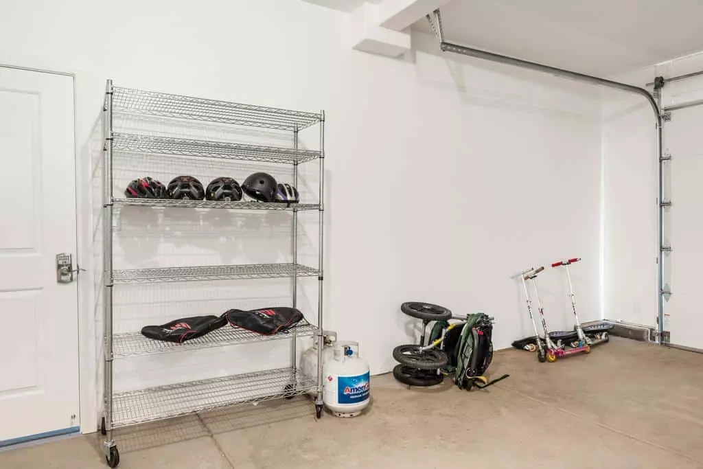 Helmets and Scooters in Garage