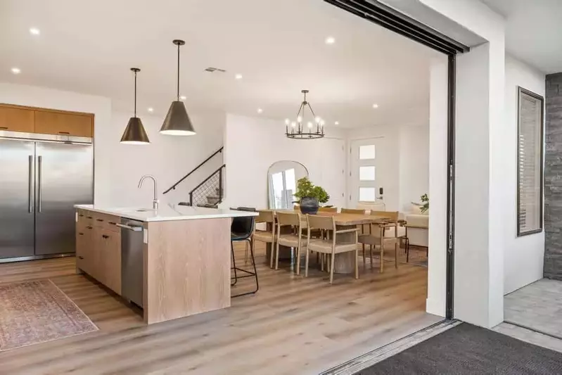 Kitchen + Sliding Doors to Patio Area