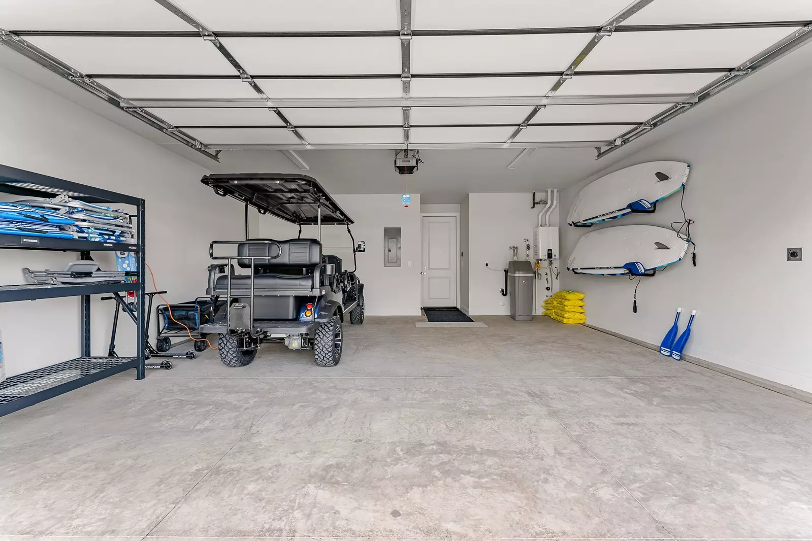 Garage Amenities - Golf Cart  Paddleboards