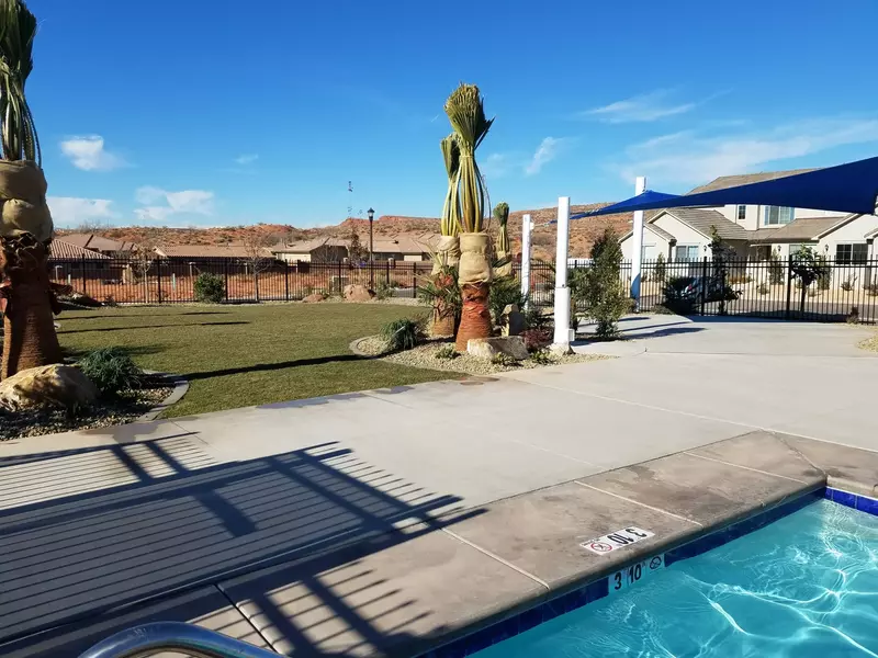 Community Pool Cover and Grassy Area